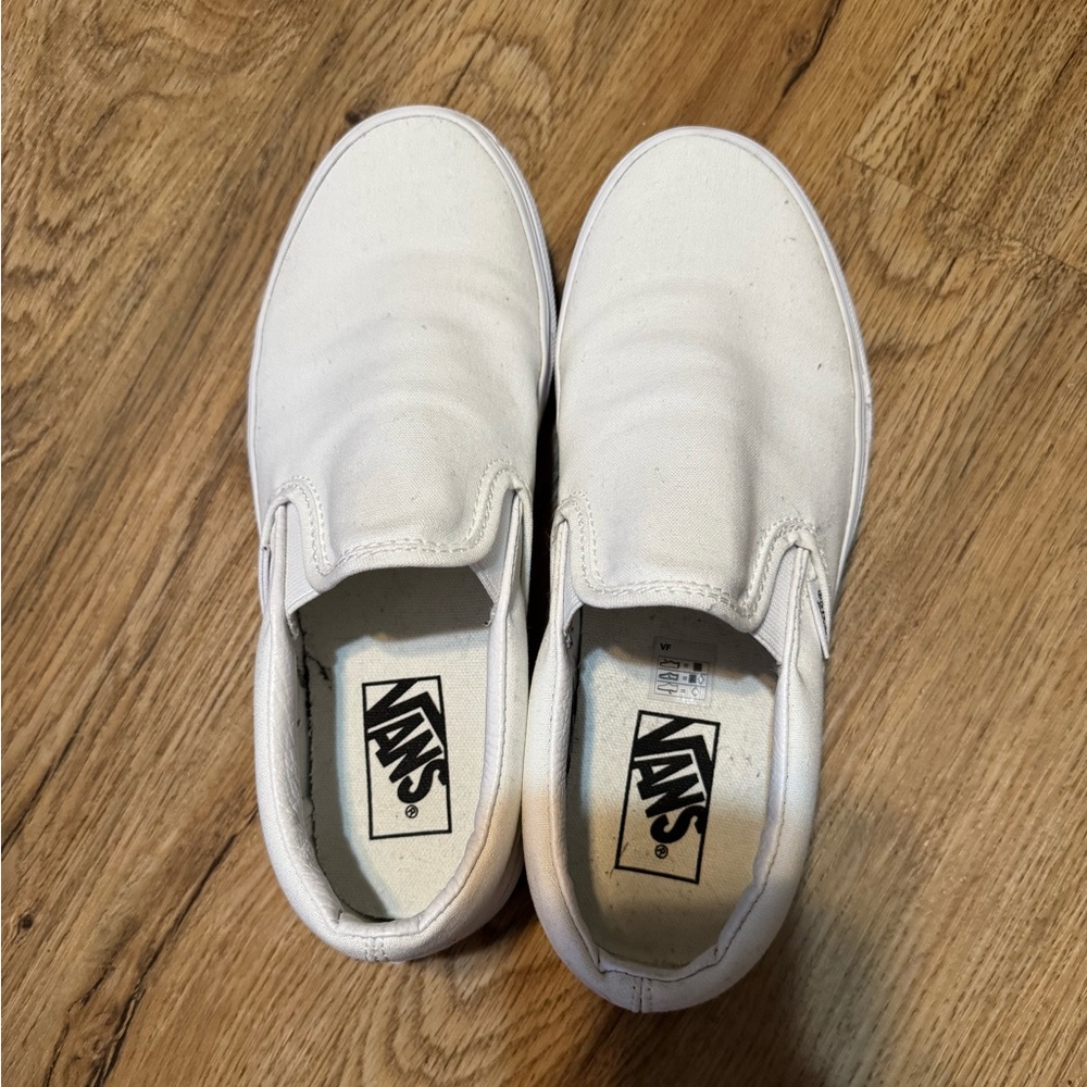 White slip on Vans